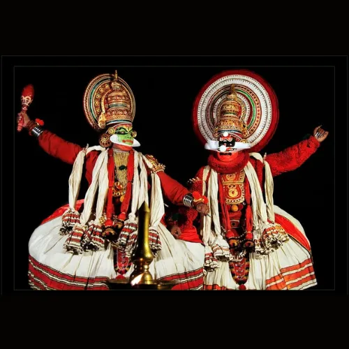 Traditional Kathakali performance in Kochi with vibrant costumes and expressive gestures