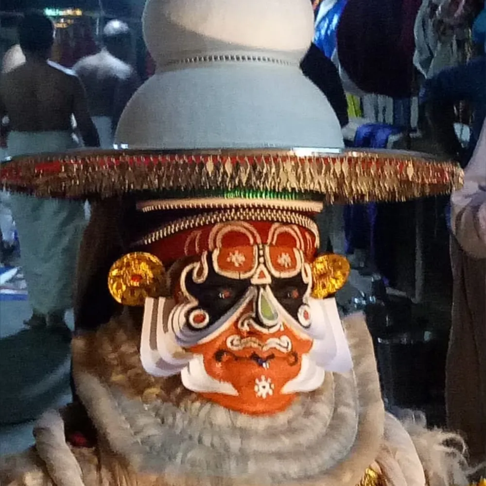 Kathakali characters depicting a divine figure