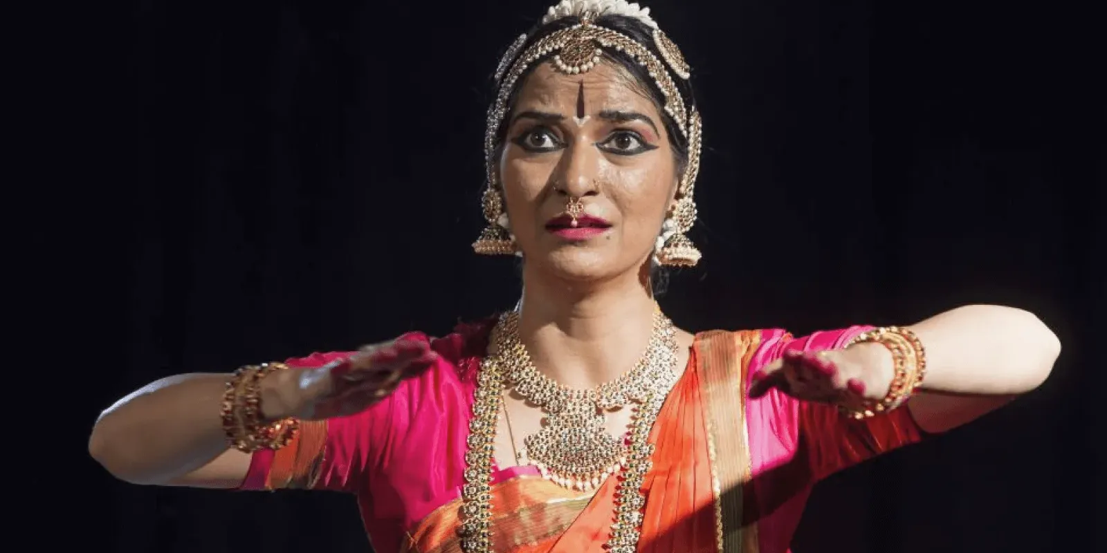 Bharatanatyam dancer performing with grace